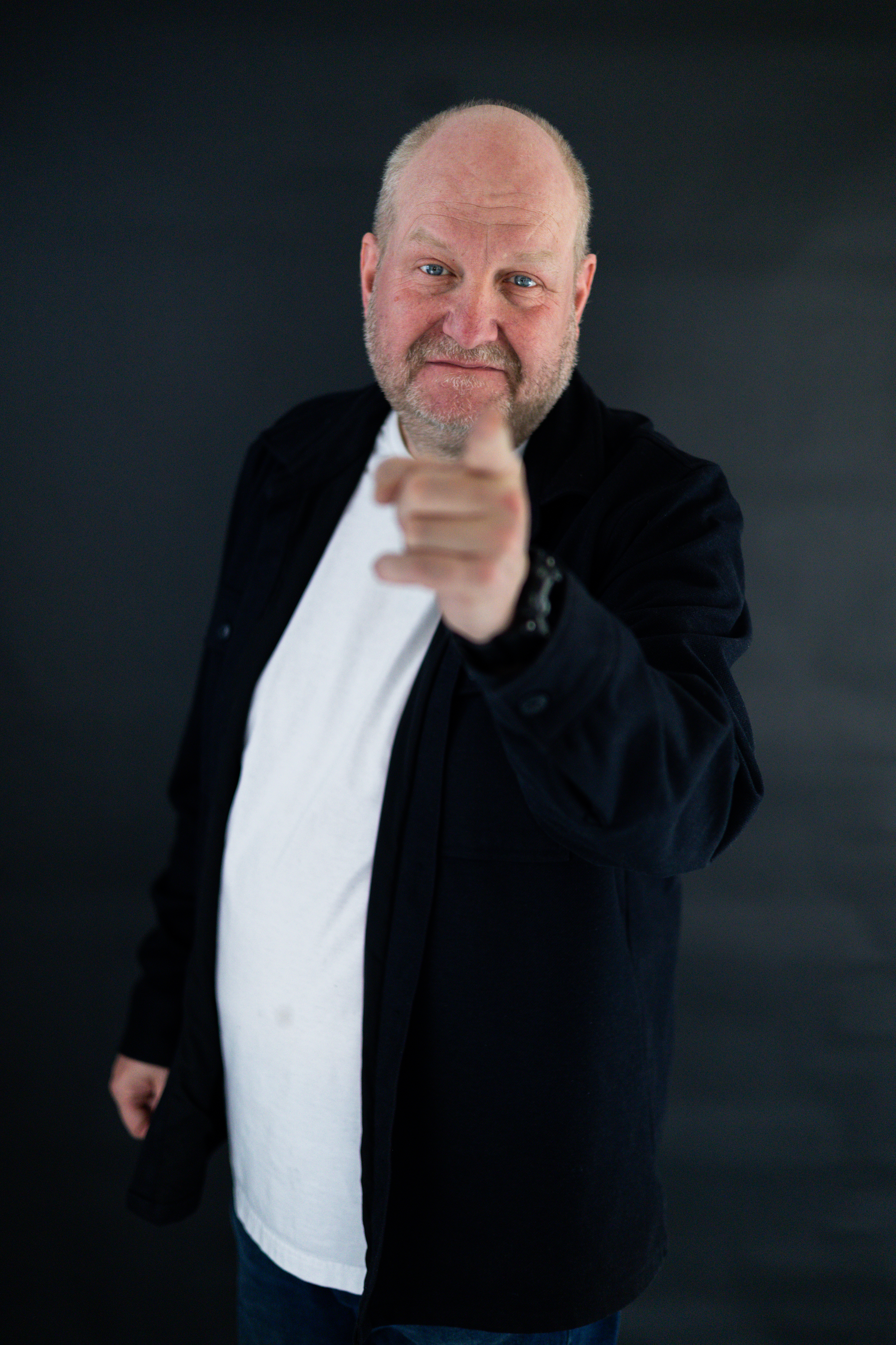 Anthony Williams pointing towards the camera